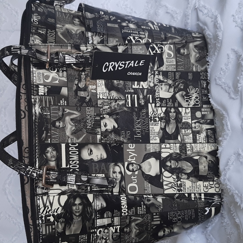 Crystale purse. Black/crea. Two straps. Novelty starlet design  Zipper o…
